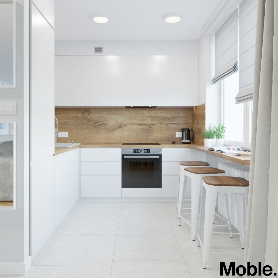 wnętrze kuchni w stylu nowoczesnym. Białe meble kuchenne z drewnianym blatem i miejscem do siedzenia.