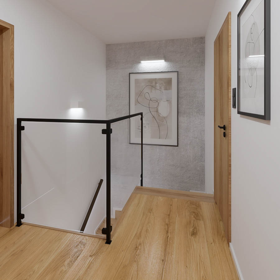 wnetrze klatki schodowej w domu jednorodzinnym. Sciana jest z betonu architektonicznego, schody sa drewniane z czarna balustrada.